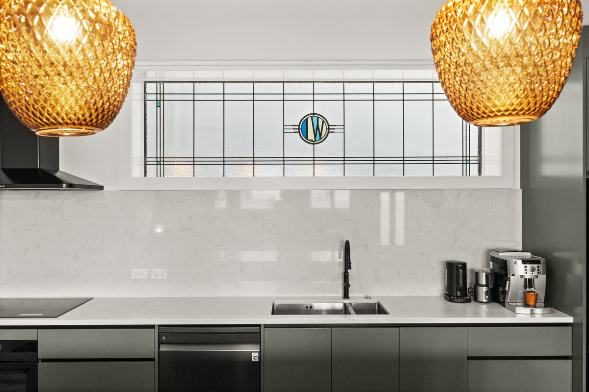 Kitchen with stained-glass window and coffee station