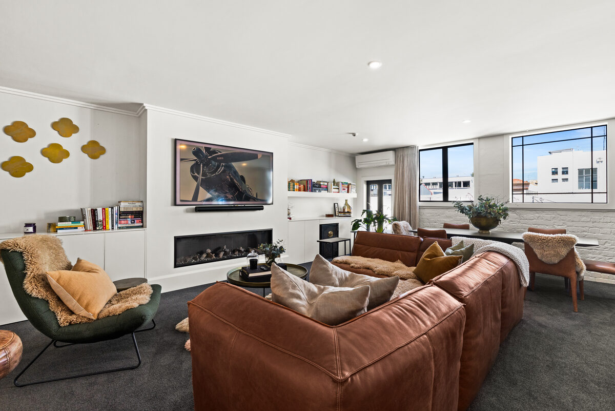 Living room with fireplace — short and long term accommodation Napier